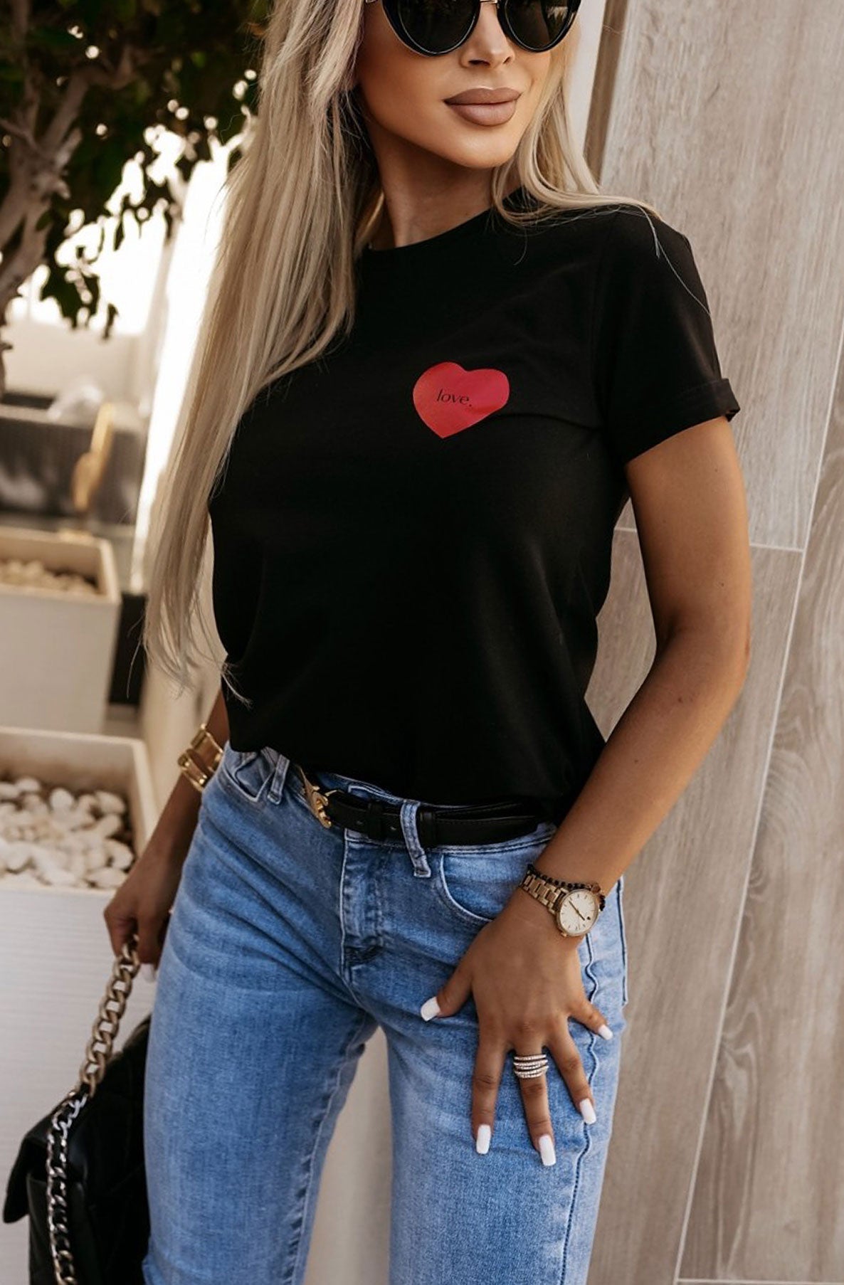 "Love" Heart Women's T-Shirt UK: Playful design, high-quality fabric for casual comfort.