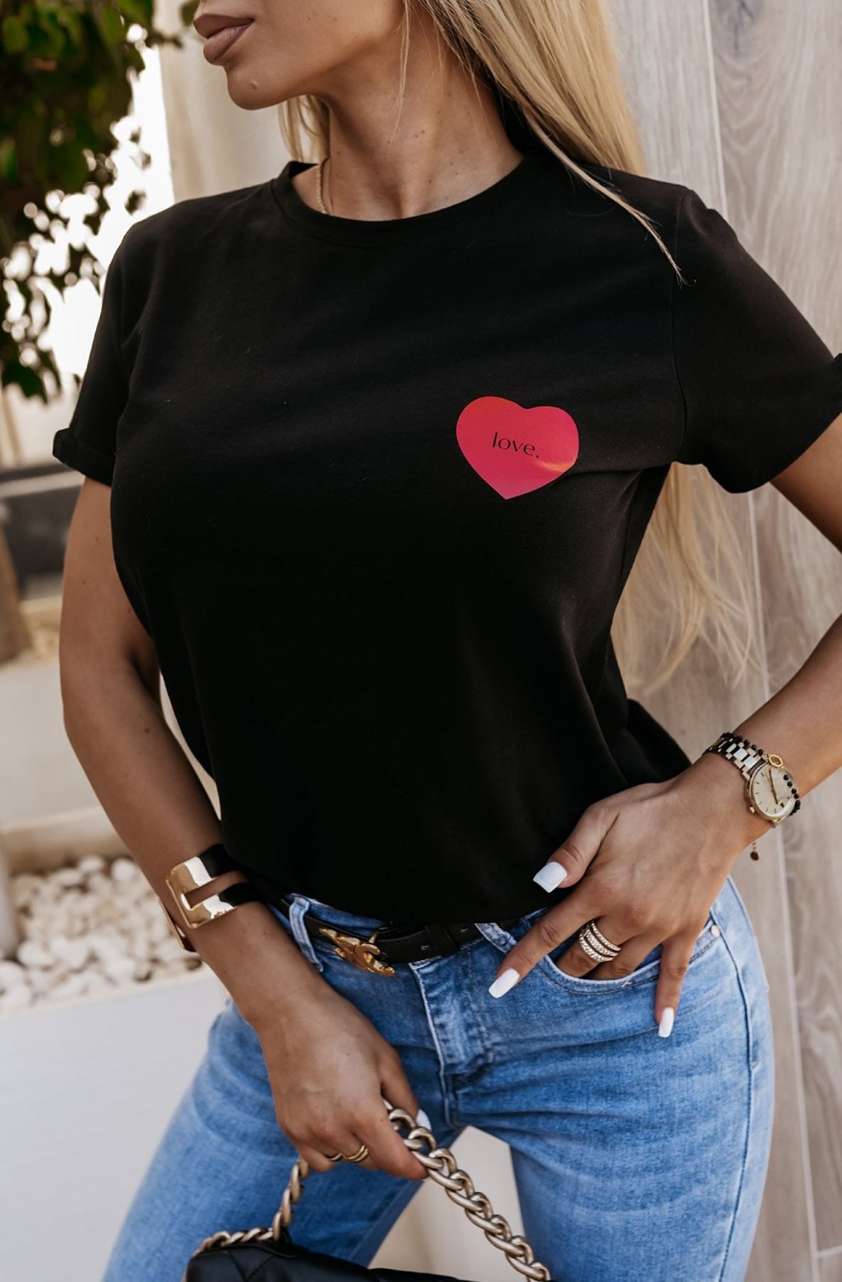 "Love" Heart Women's T-Shirt UK: Playful design, high-quality fabric for casual comfort.